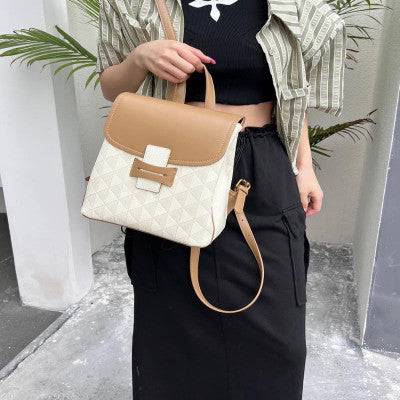 شنطة ظهر جلد باللون البني والبيج - Ebuy.sa